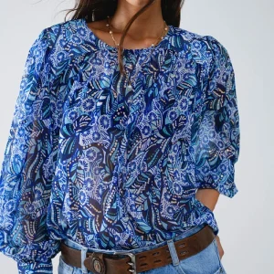 Blusa com estampado abstrato e mangas em balão em azul