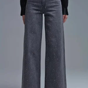Calças de ganga de pernas largas com strass preto