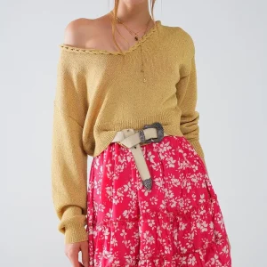 Camisola leve com decote em V largo e pormenores entrançados em dourado